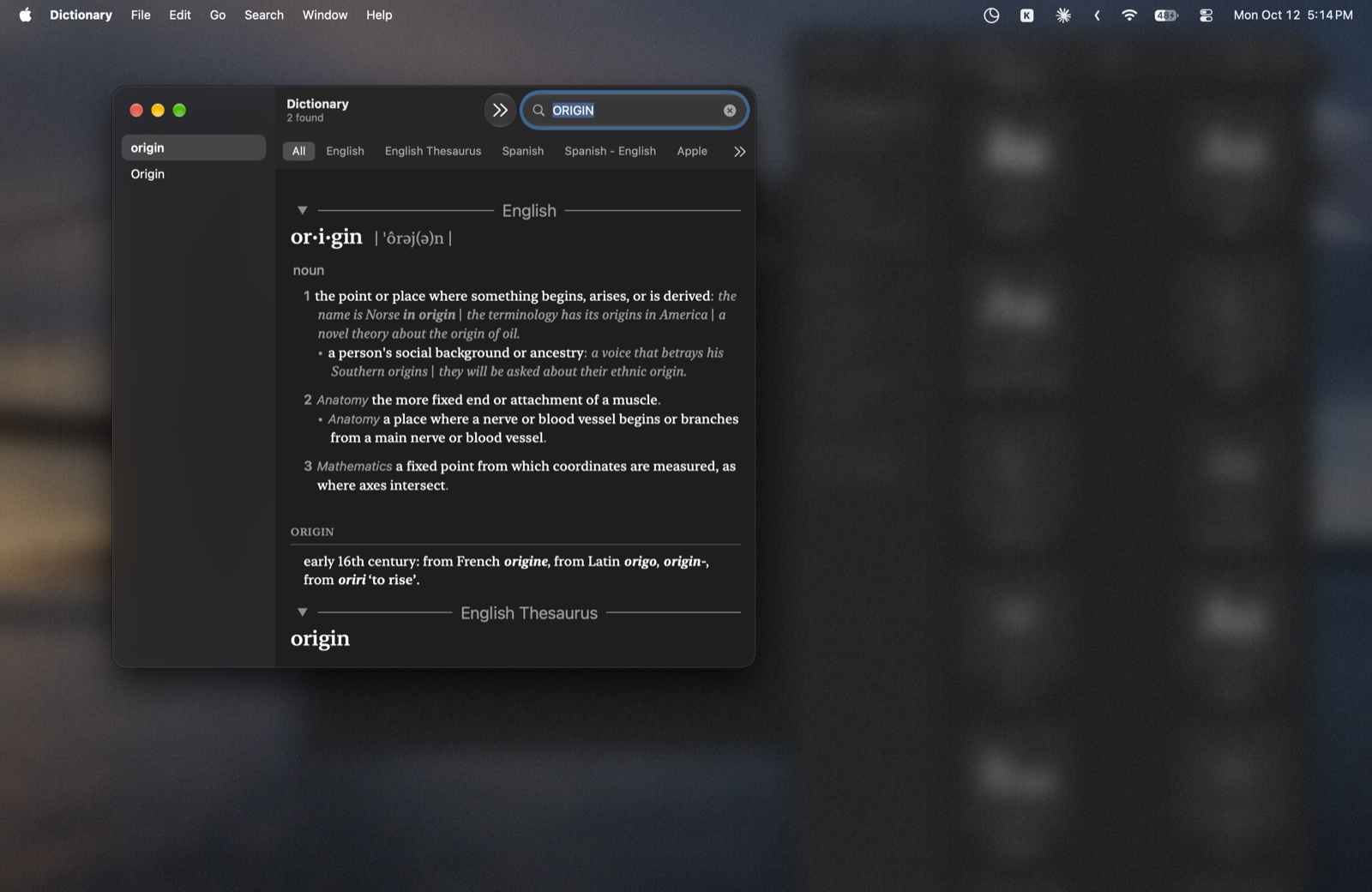 Dictionary in focus with the rest of the desktop blurred
