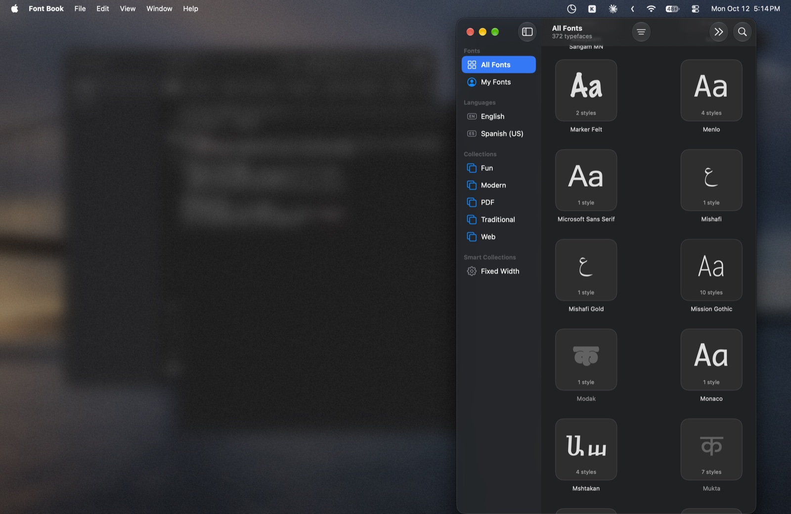 Font Book in focus with the rest of the desktop blurred